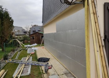 début de la pose de l'isolant